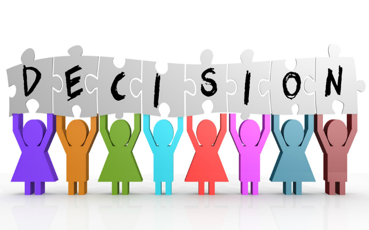 description_of_image_used_in_decision-making_in_adult_safeguarding_figures_holding_up_the_word_decision