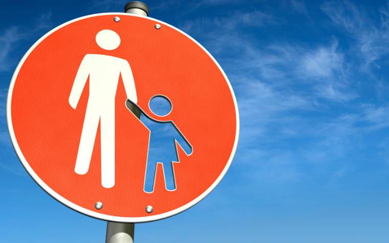 description_of_image_used_in_parental_mental_capacity_case_law_traffic_sign_with_parent_and_child_bluedesign_fotolia